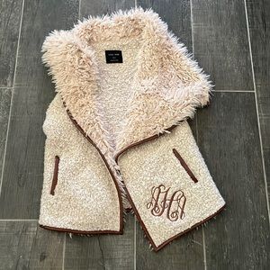 Love tree vest is monogrammed if you could cover that